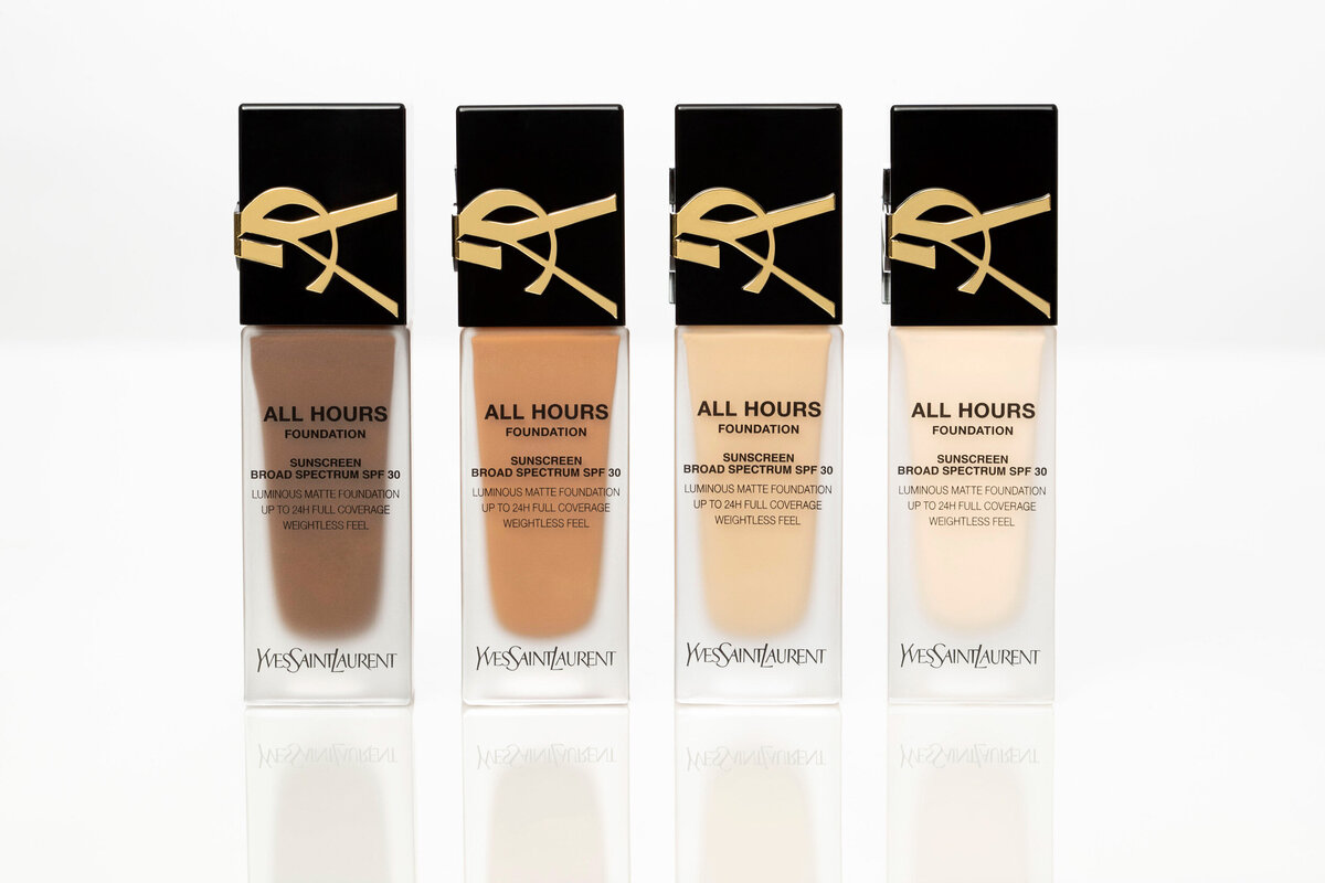 YSL foundation bottles in a row, showcasing different shades of the product, photographed by Ylva Erevall.