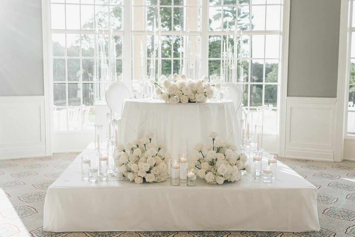 Elegant sweetheart table with white roses