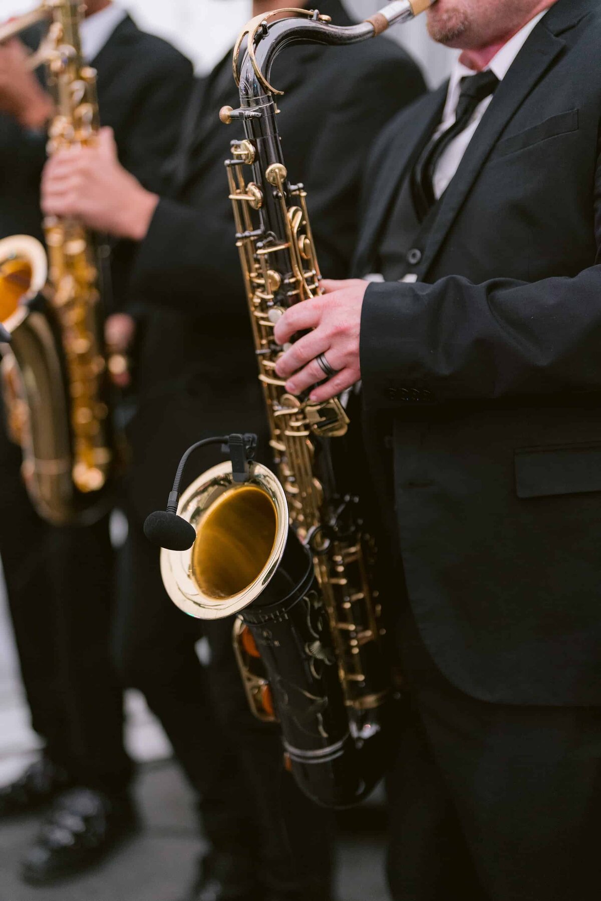 Saxophone players at a black and white wedding in Colorado