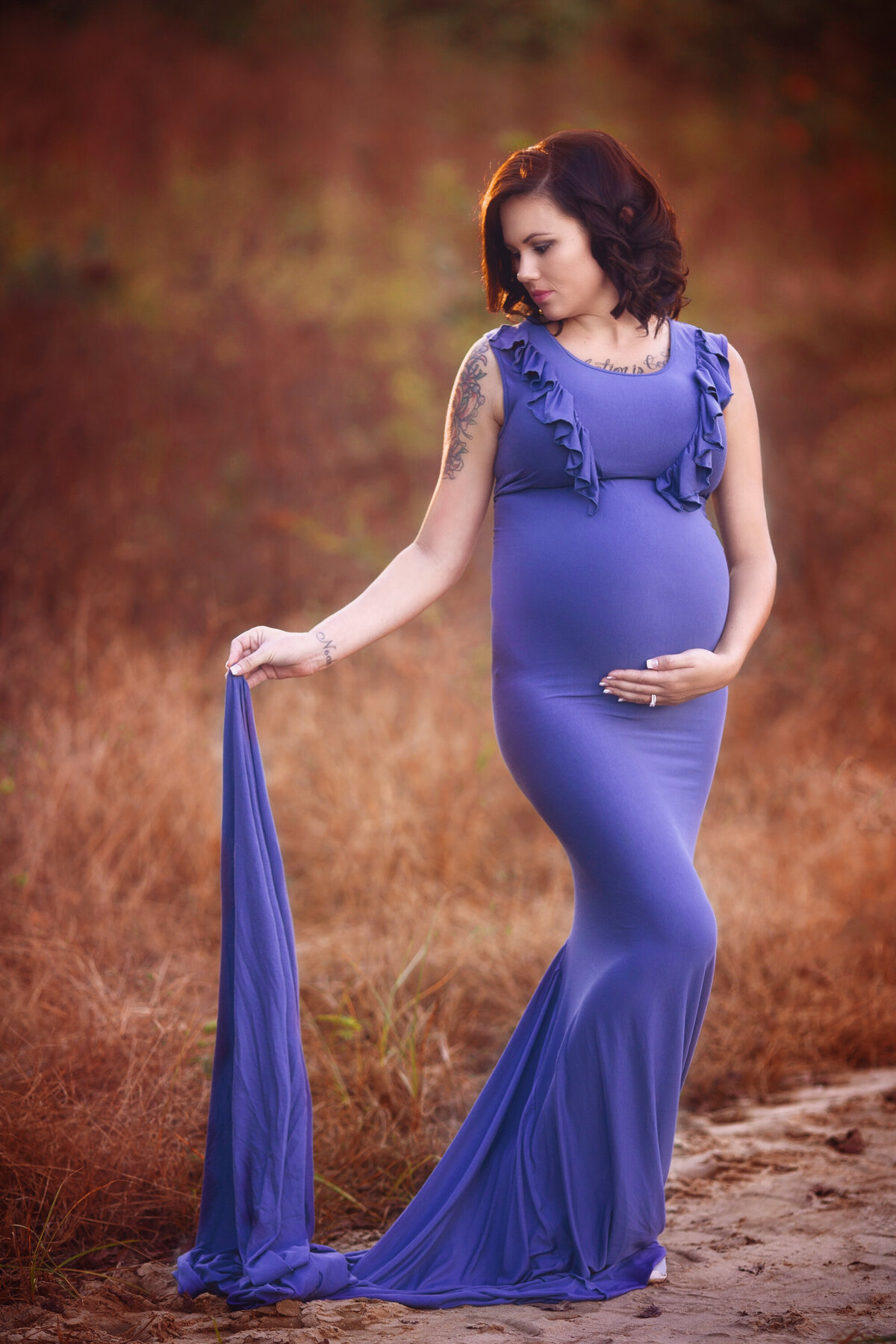 brown field sunlight fall purple dress pregnant