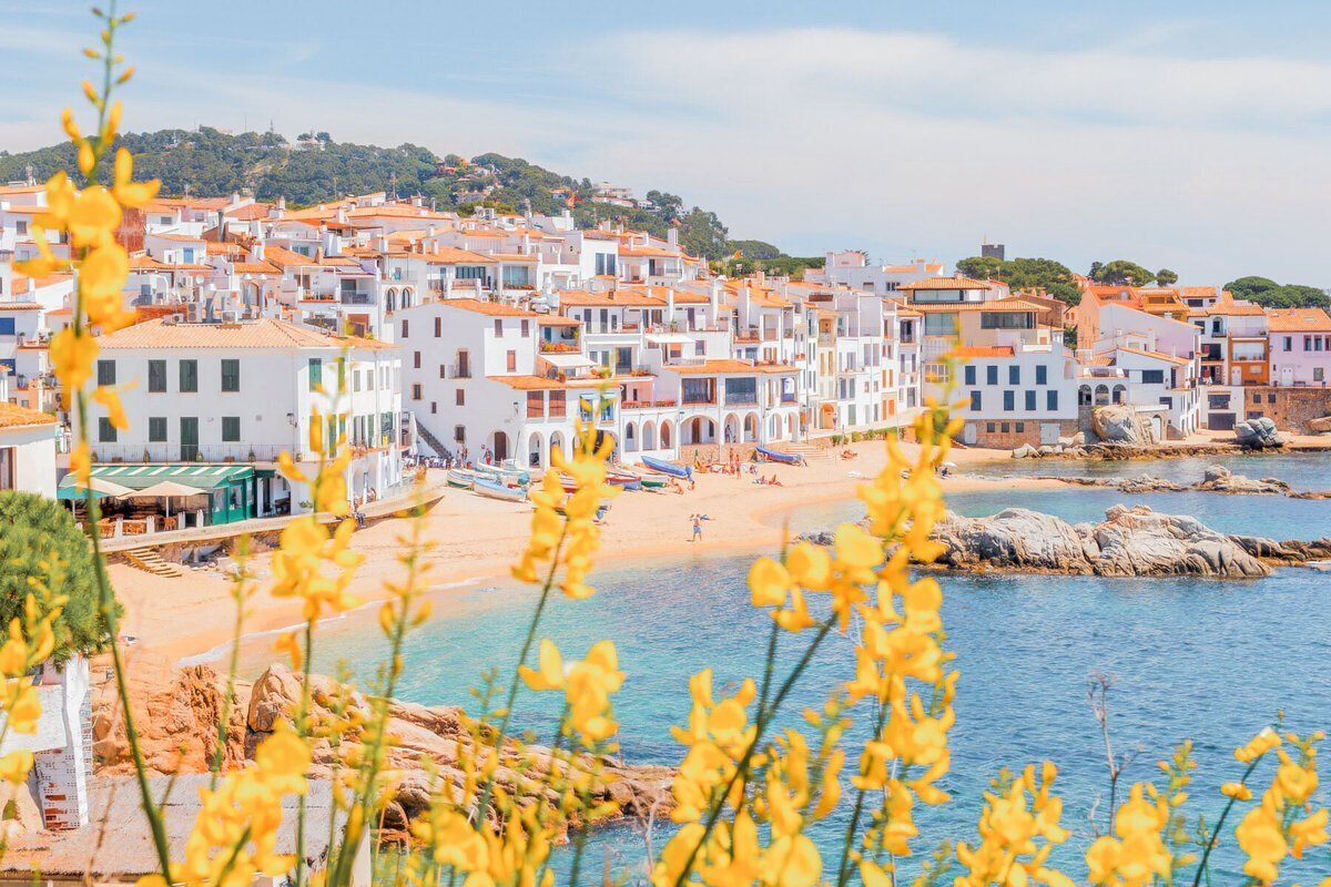 European buildings on a beach front area planned by elite personal vacation planner