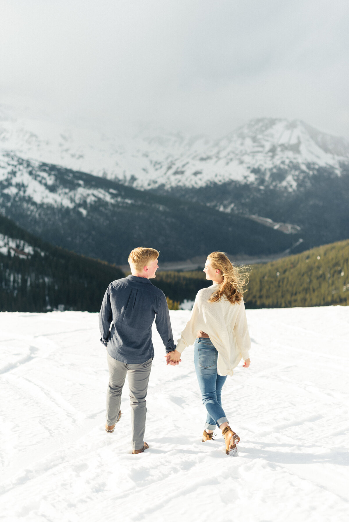 Winter Colorado adventure engagement session at the continental divide, Loveland Pass