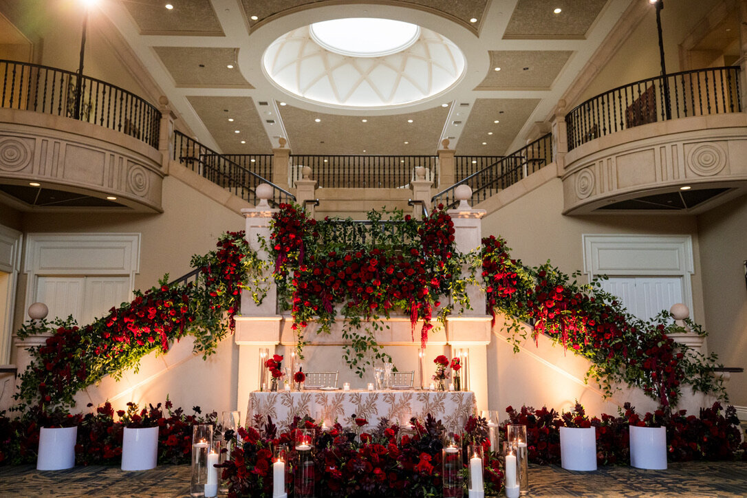 candle light, pillar candles, staircase flowers, white champagne lighting, sweetheart table, golf club 