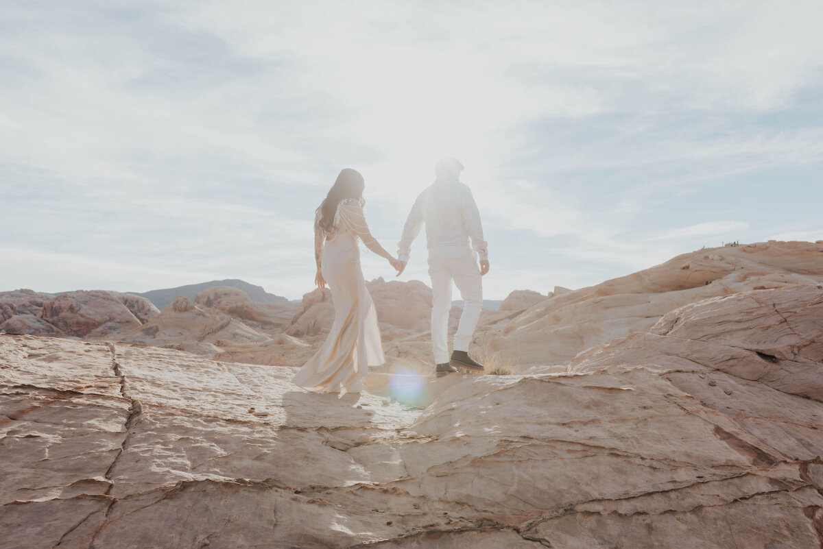 couple walking in desert