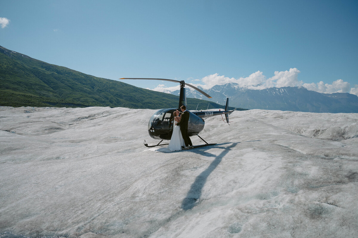 helicopter glacier couple