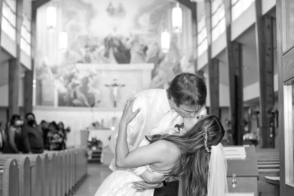 bride-groom-kissing-altar-wedding-toronto