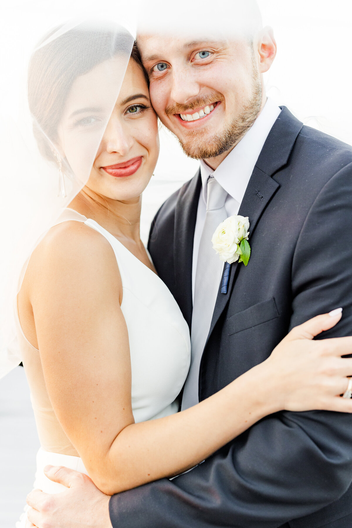 25_bride_and_groom_heads_together_golden_hour_in_madison_wisconsin