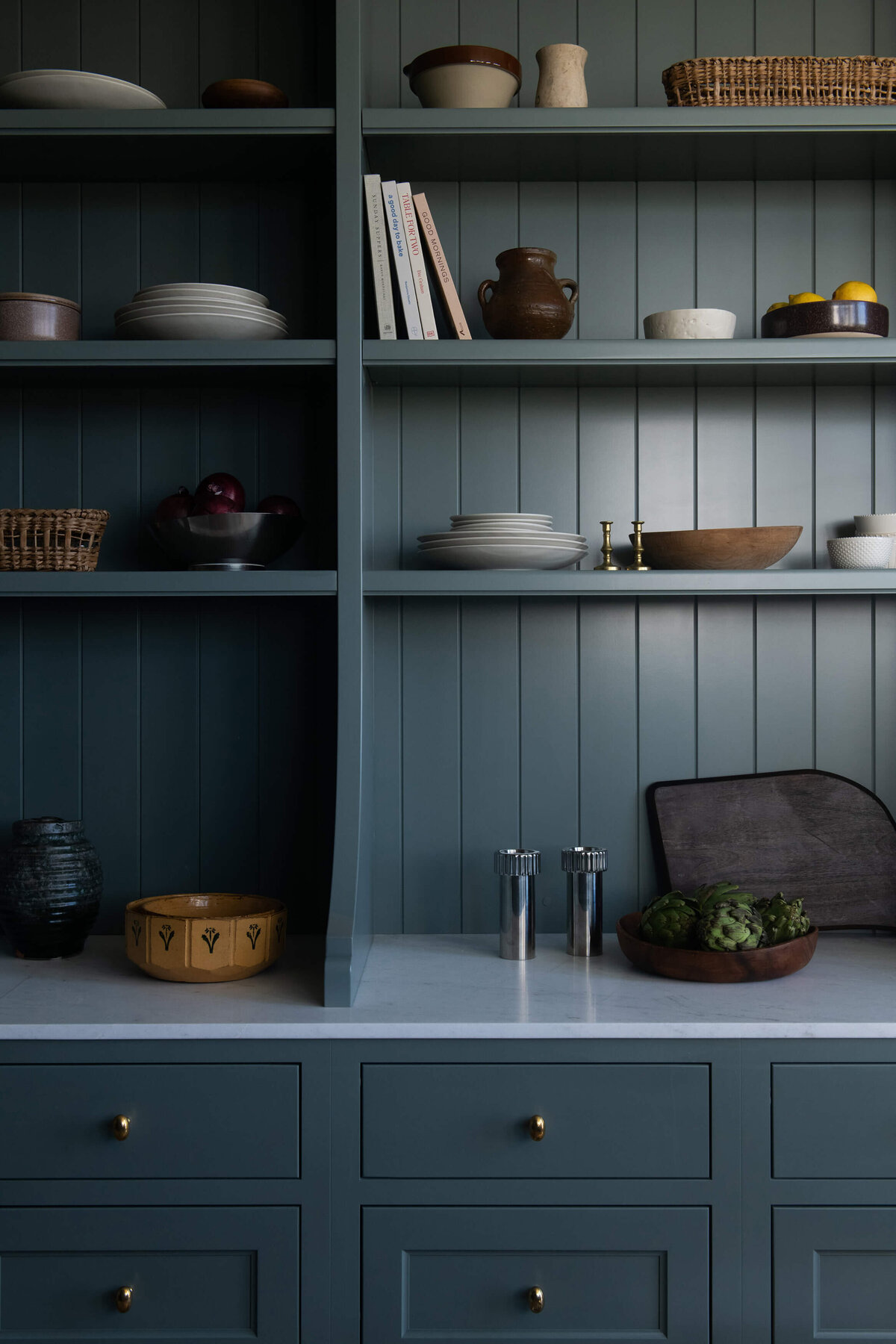 dutch-tudor-pantry-shelves-with-styled-dishware