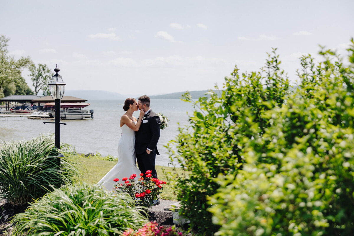 Bride and groom in distance at Canandaigua Country Club wedding , NY