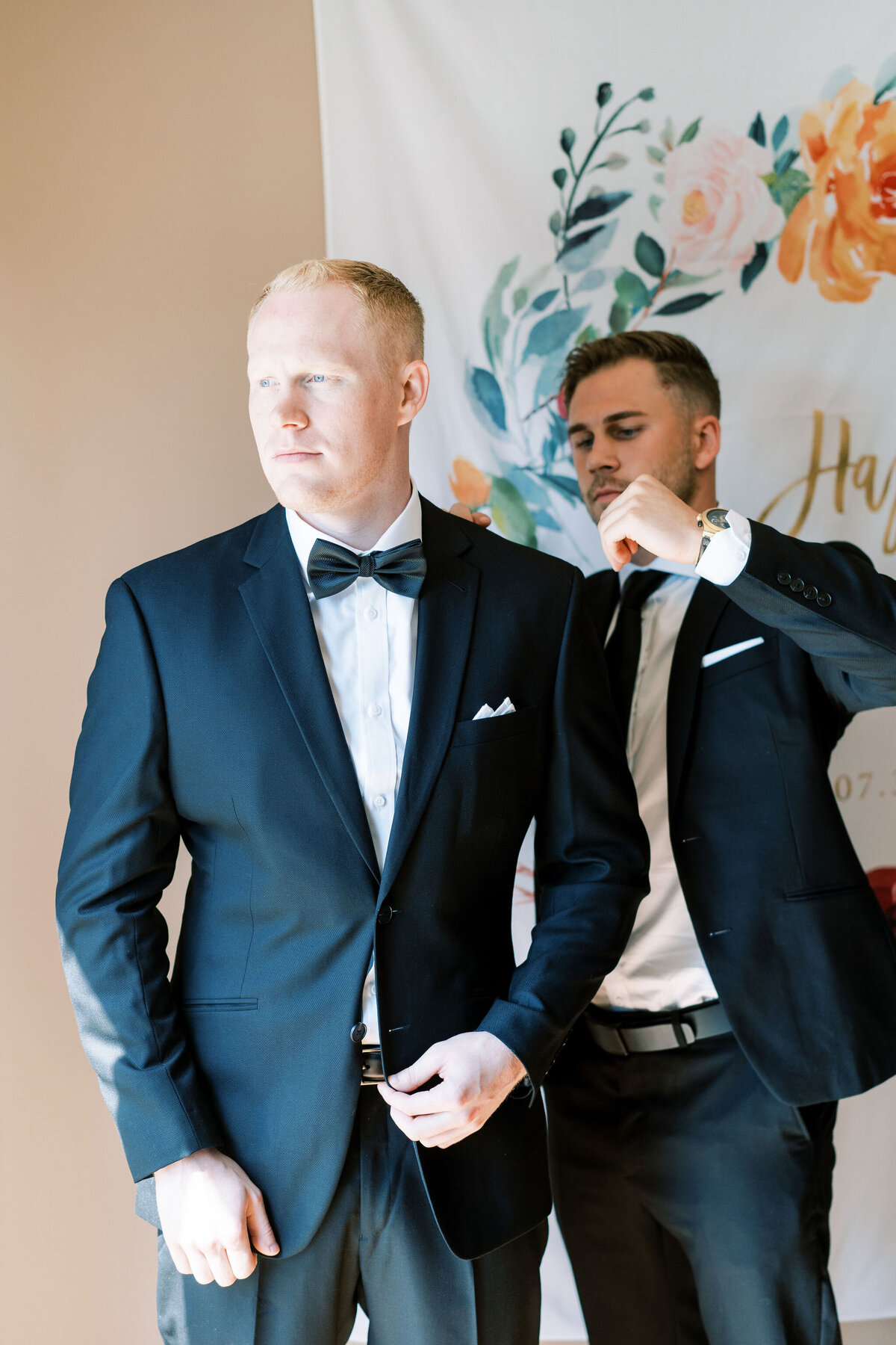 groom-getting-ready-bowtie-suit