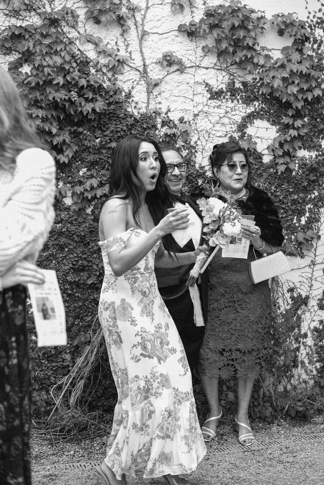 Guests reacting with joy during a wedding ceremony in Denver, captured on film and digital.
