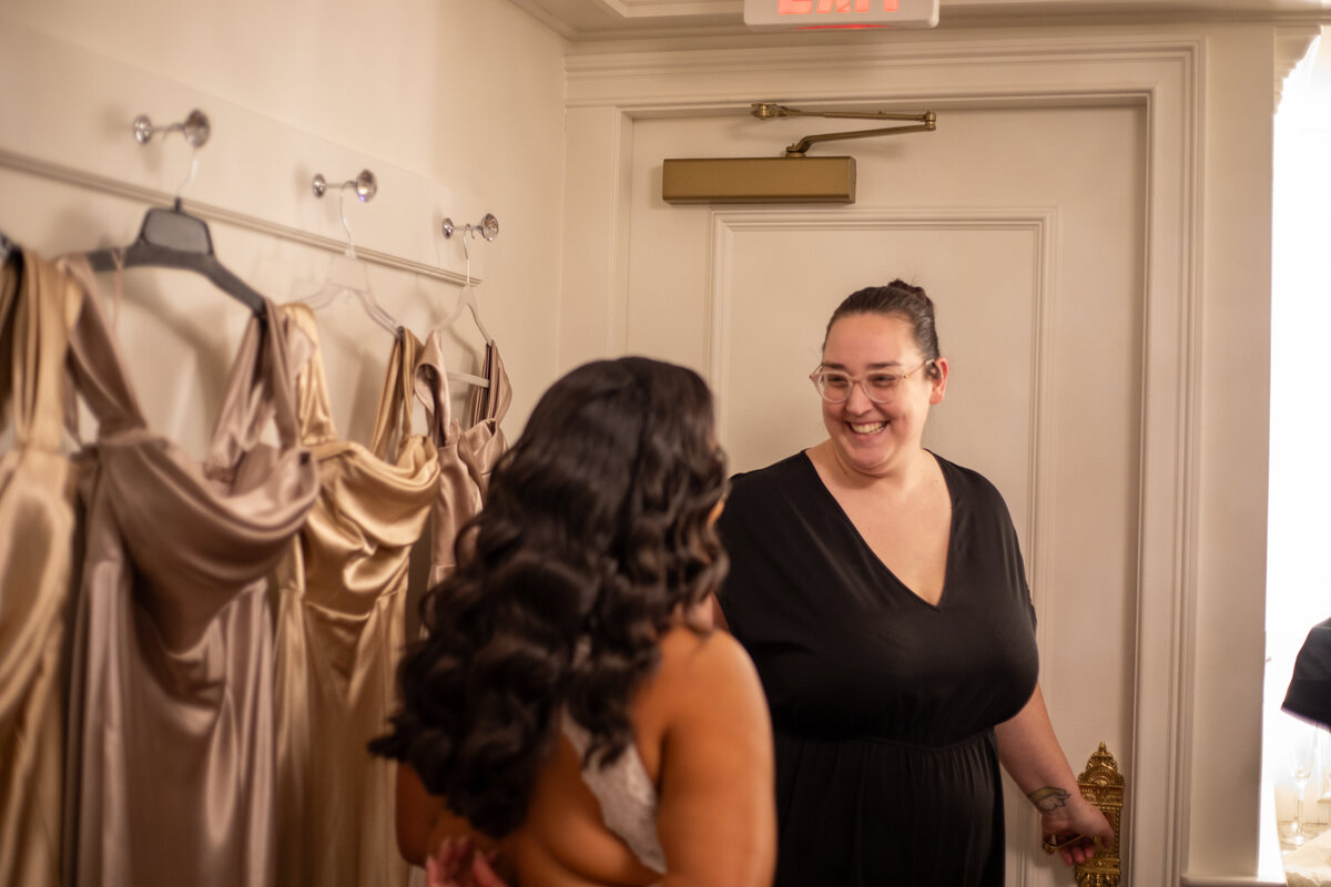 Rachel and bride laughing