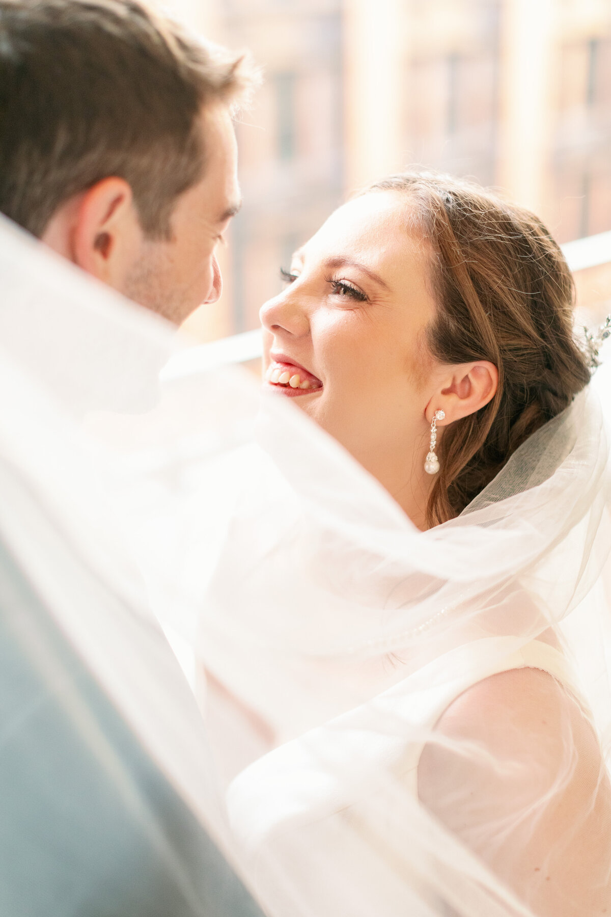 Bride-with-Groom-on-balcony