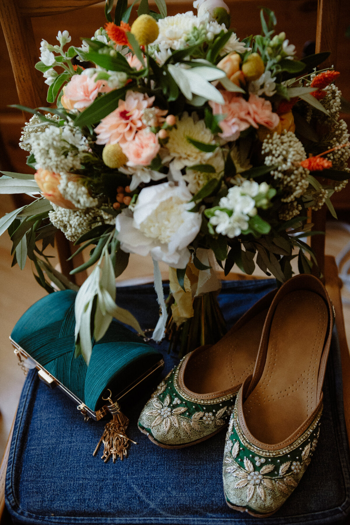 bridal-bouquet-and-flat-guilded-shoes-on-a-chair-1