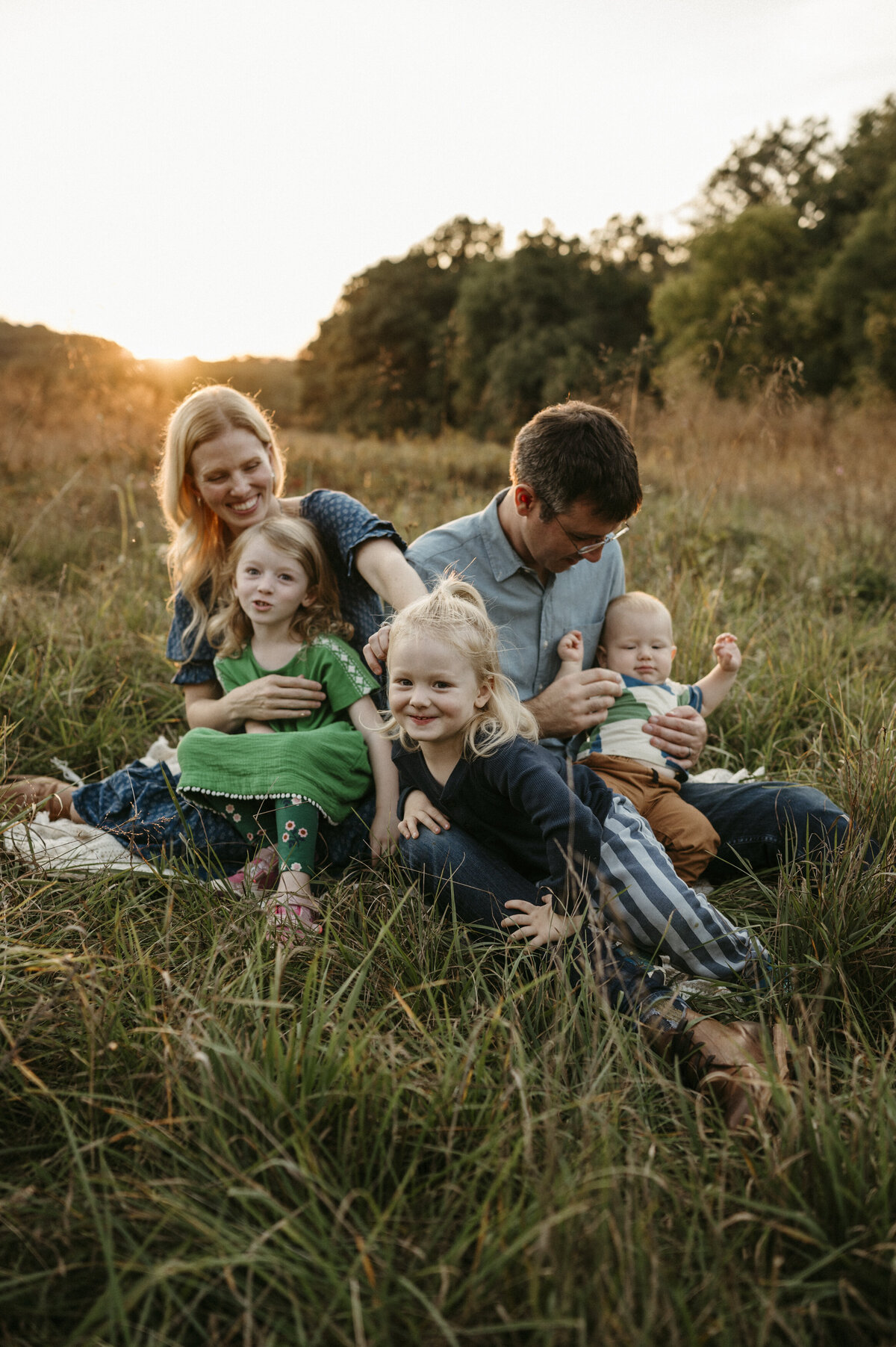 Family in field at Golden Hour