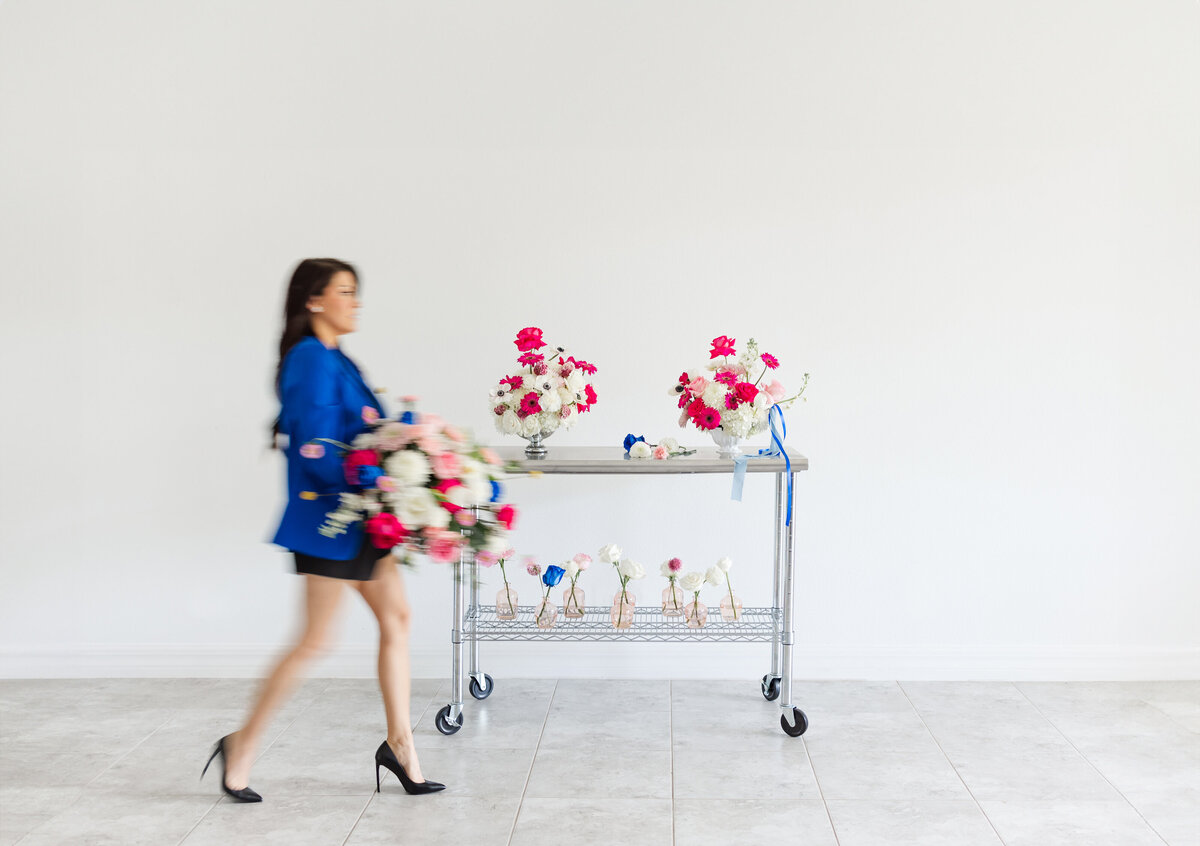 flowers-florist-walking-blue-jacket