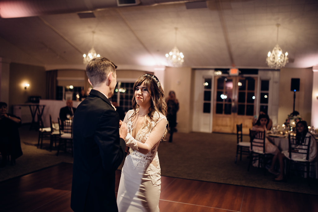 Wedding Photograph Of Bride And Groom Staring At Each Other While Dancing Los Angeles
