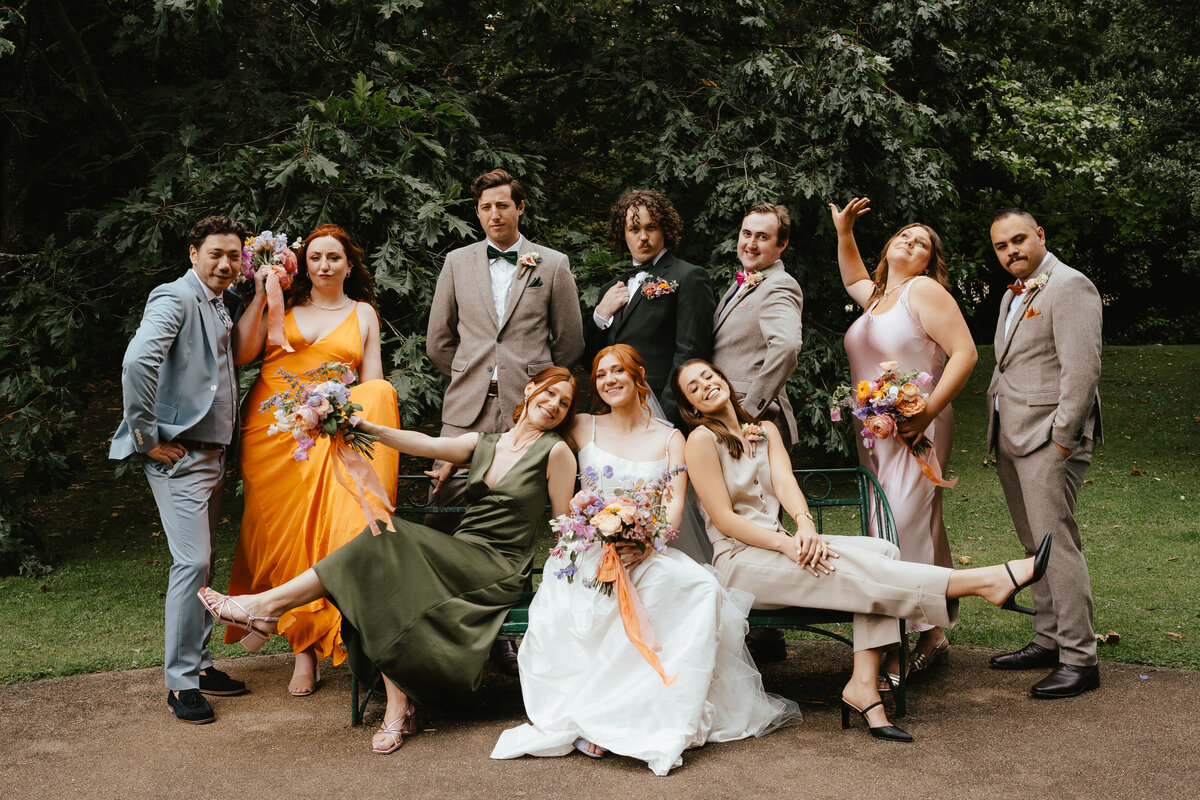 full bridal party in the gardens at the Royal College of Physicians wedding venue