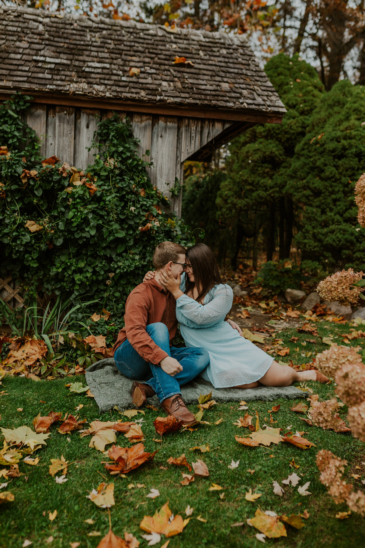 Bride and groom in a field, whimsical Indiana wedding day portrait.