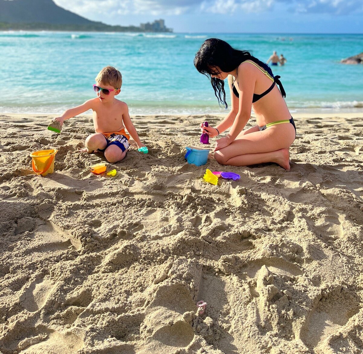 kids playing in the sand
