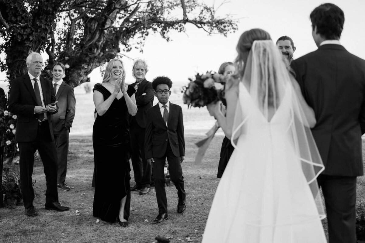 family-cheering-for-couple