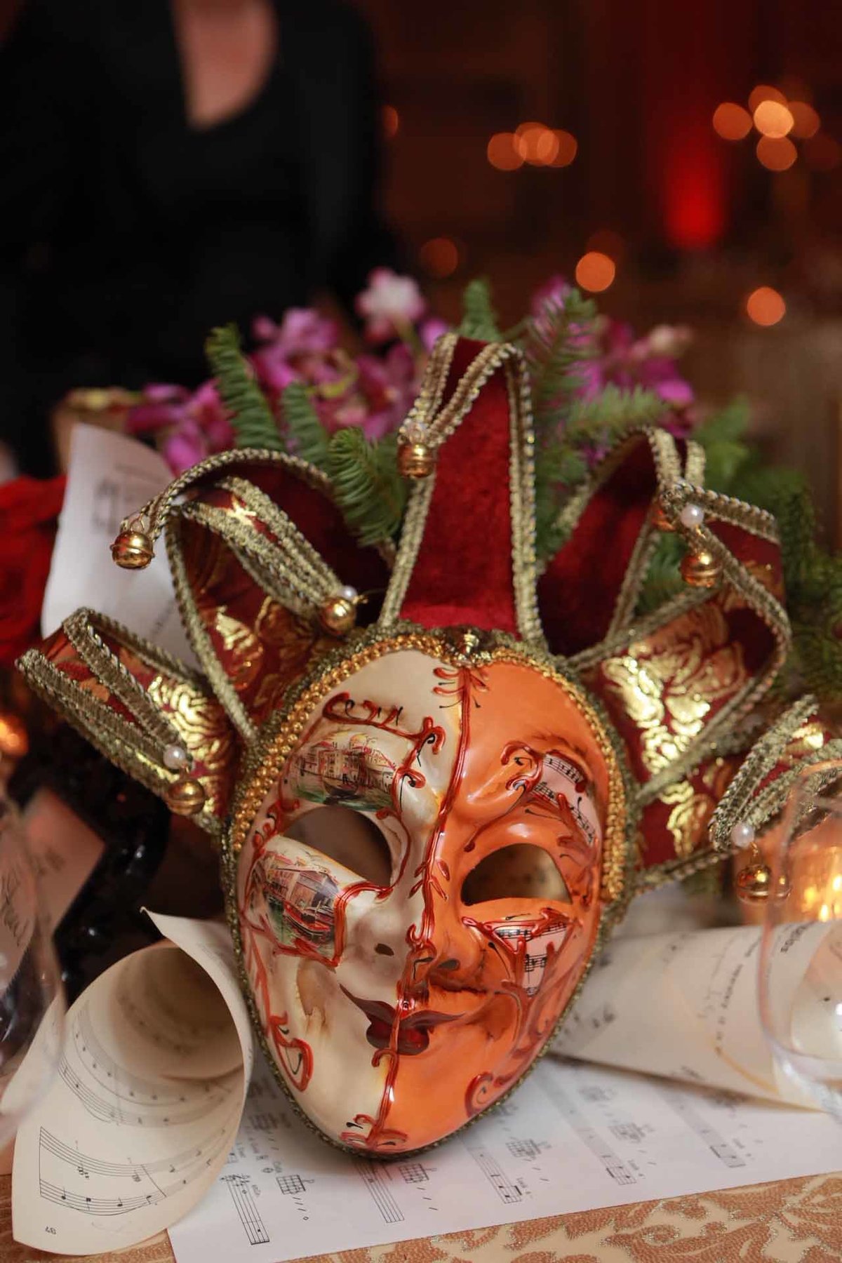 holoday party decor with vintage carnival masks, and music sheets