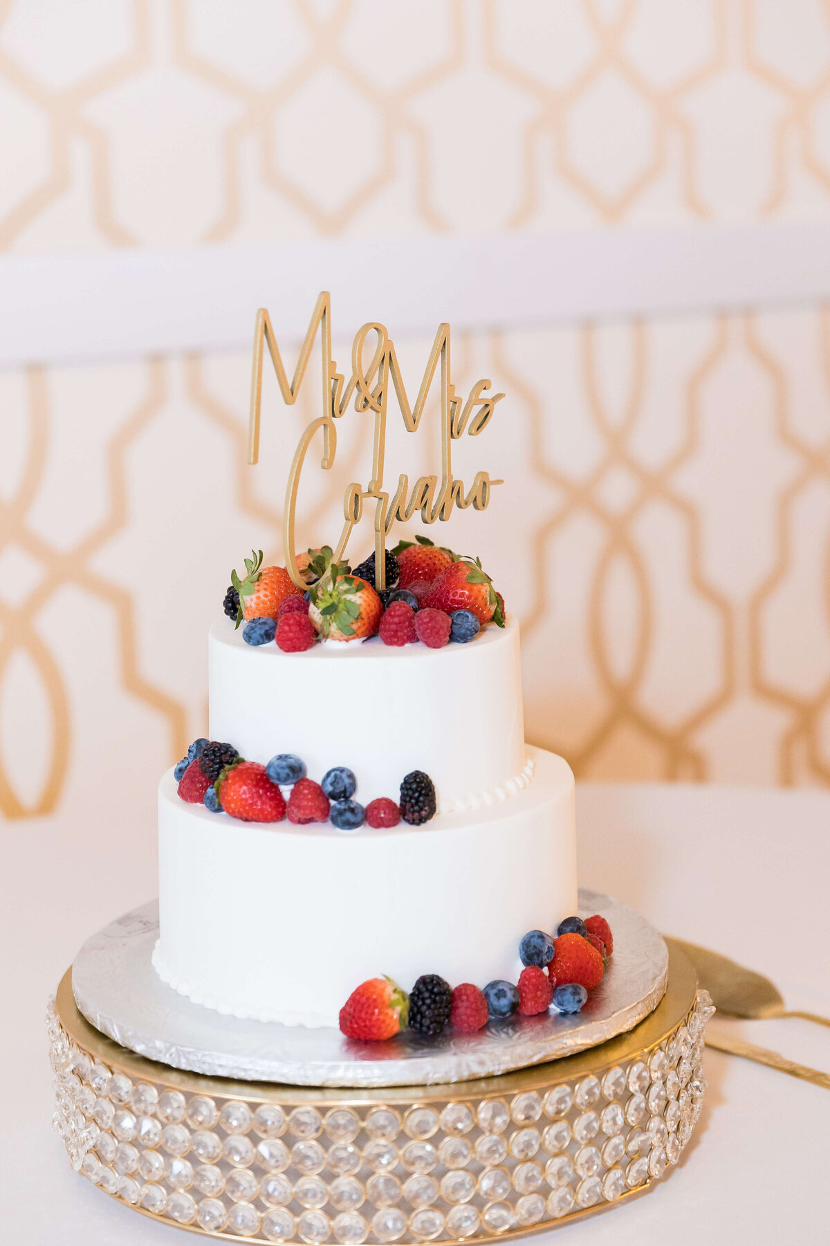 3 tiered wedding cake with berries at  The Gatsby in Shelbyville,KY