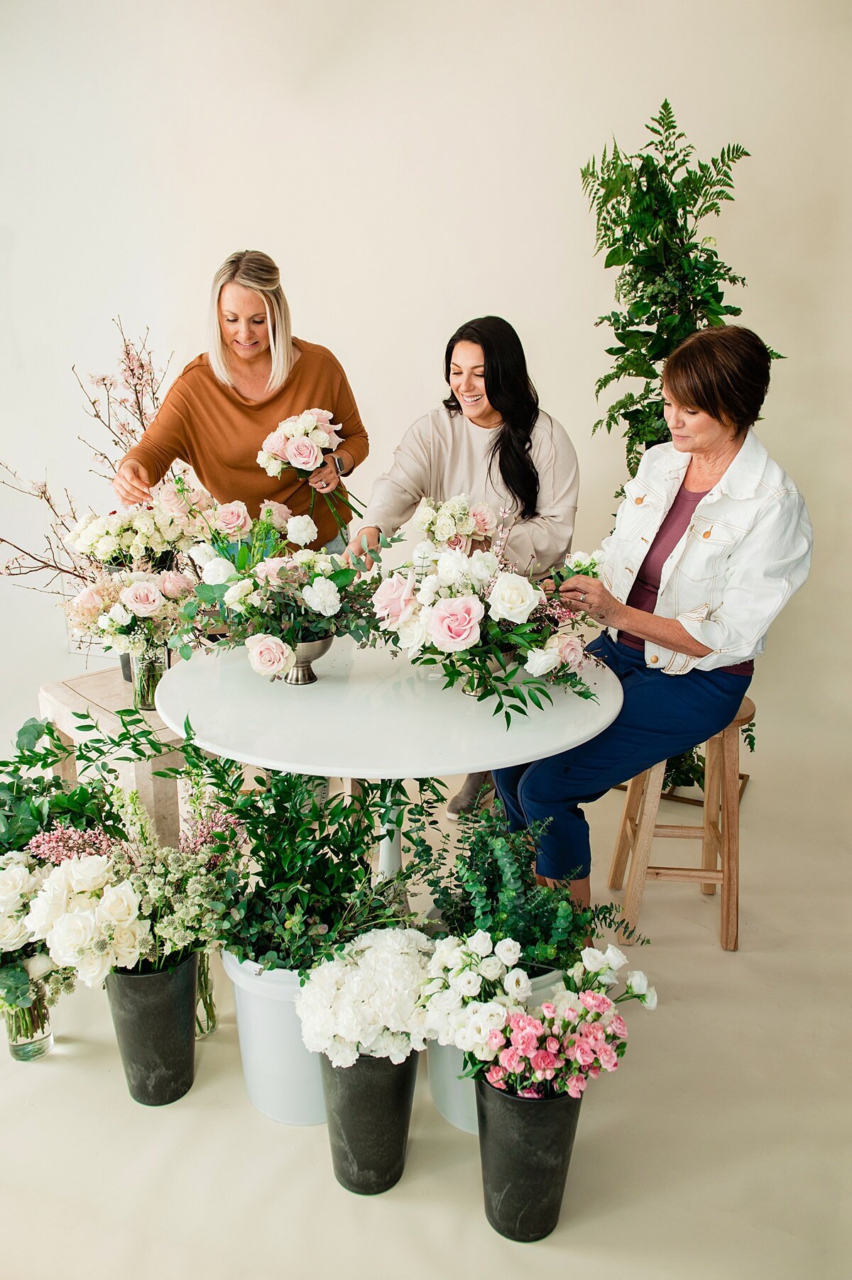 Group photo of Florists working together to put together a wedding order