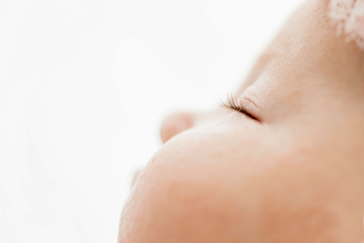 Close up on a newborn babyes ehy. Captured by Collingwood Newborn Photographer Jennifer Walton