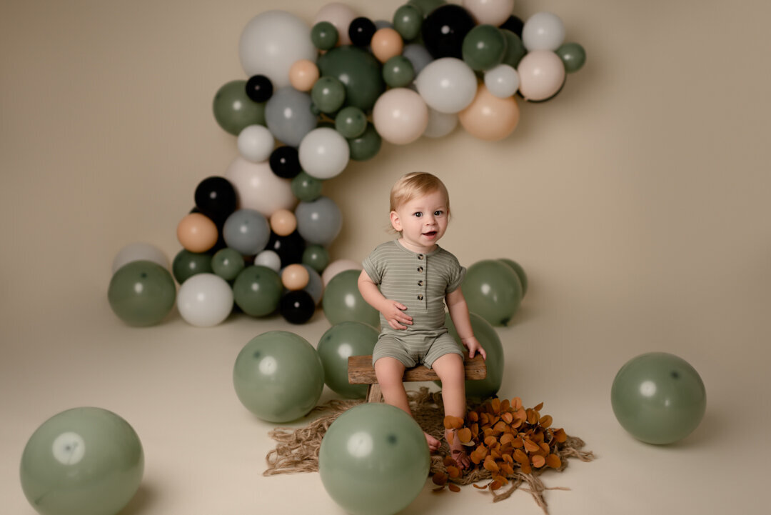 Children Milestone Photography with Green Balloons by For the Love Of Photography