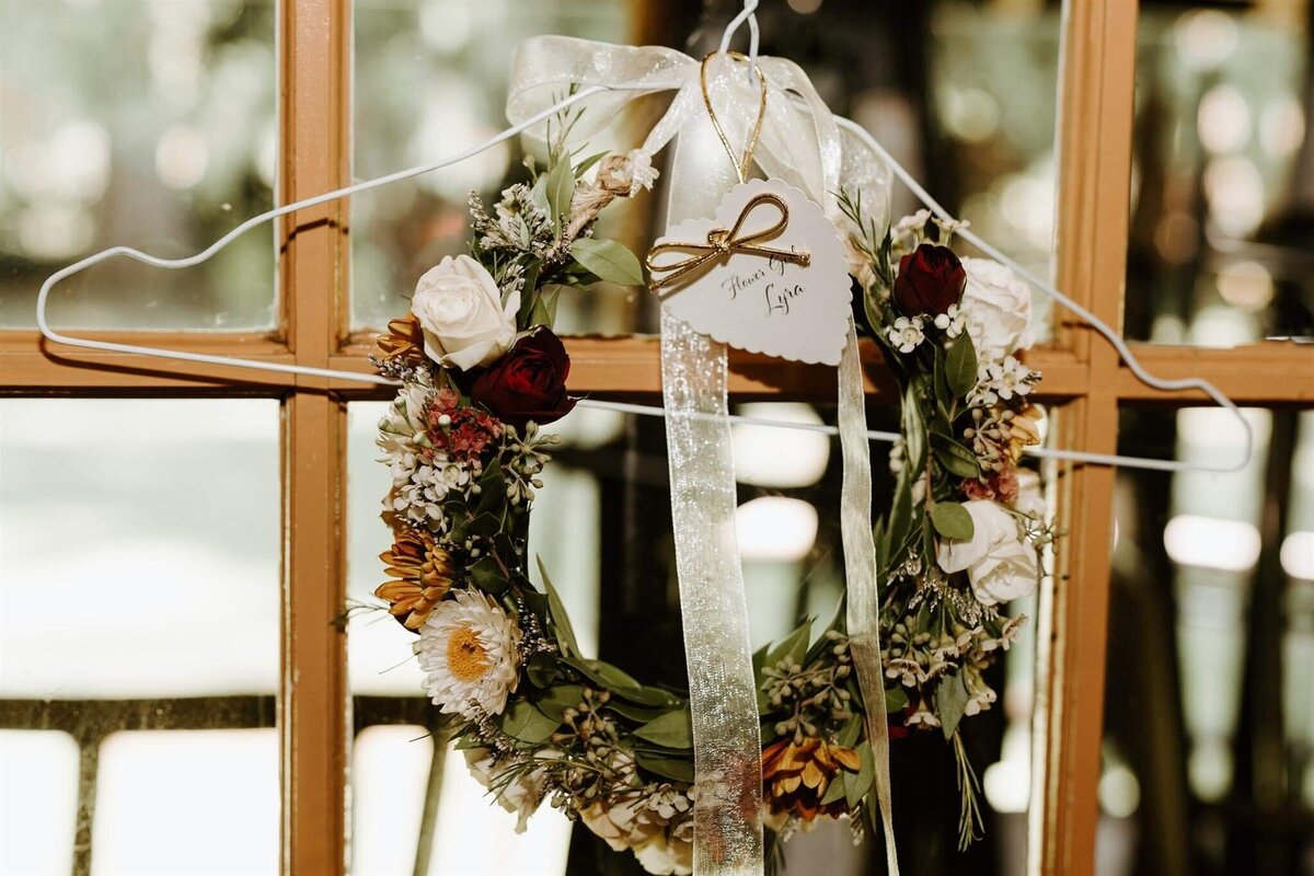 Floral crown by Flowers and Thyme on a hanger.
