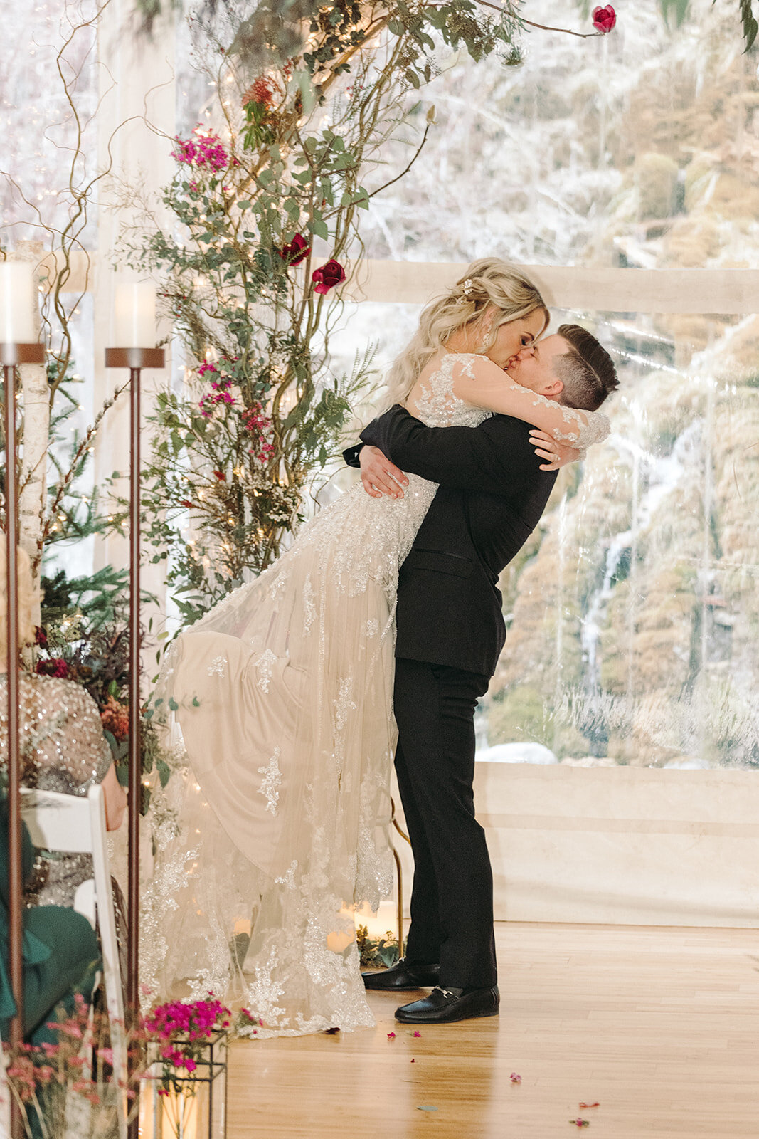 Utah Wedding Photography capturing groom lifting bride after Spring wedding