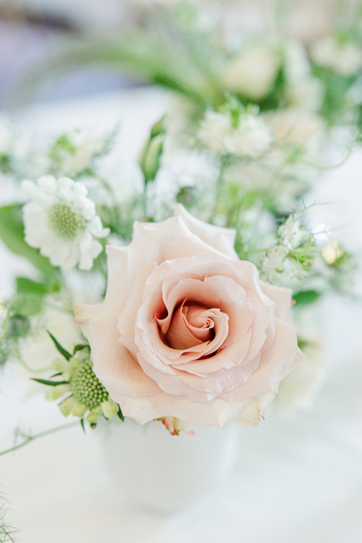 Wedding floral centerpiece with roses