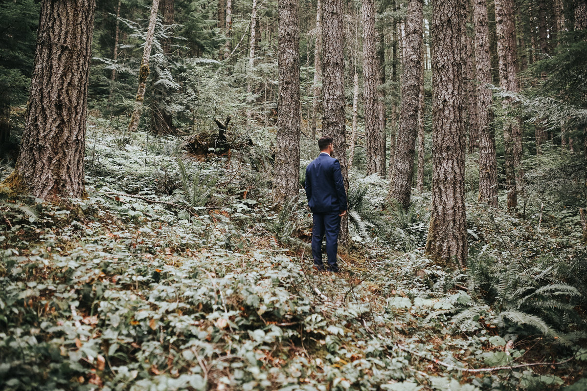 First look with bride and groom in the woods of Port Angeles, Washington