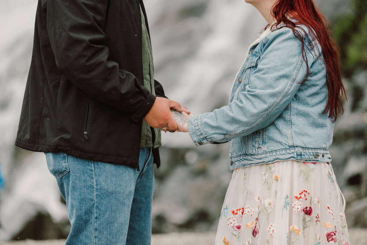 couple hold hands