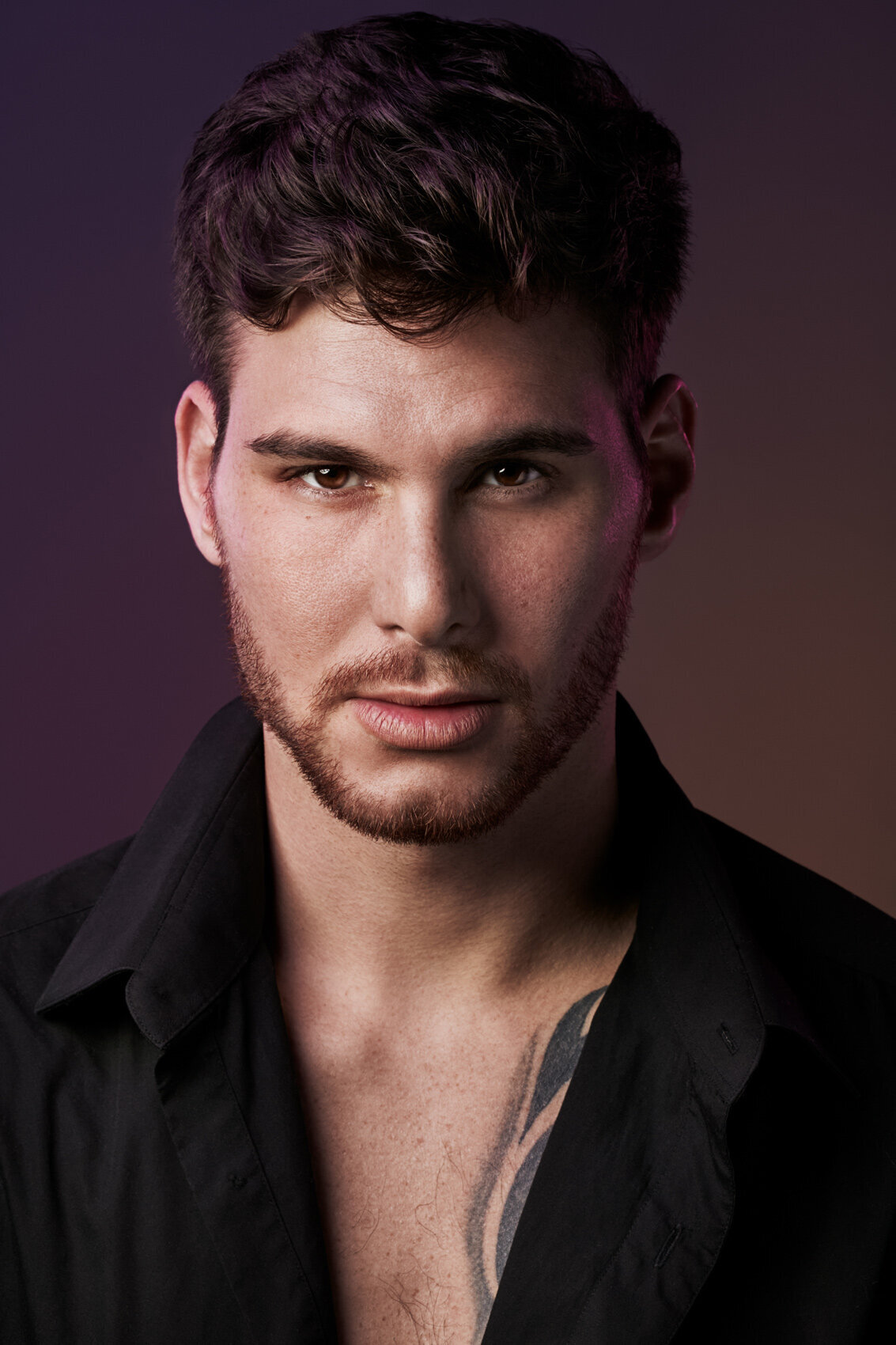 Striking portrait of Benjamin Lukovski with an intense expression, photographed by Ylva Erevall.