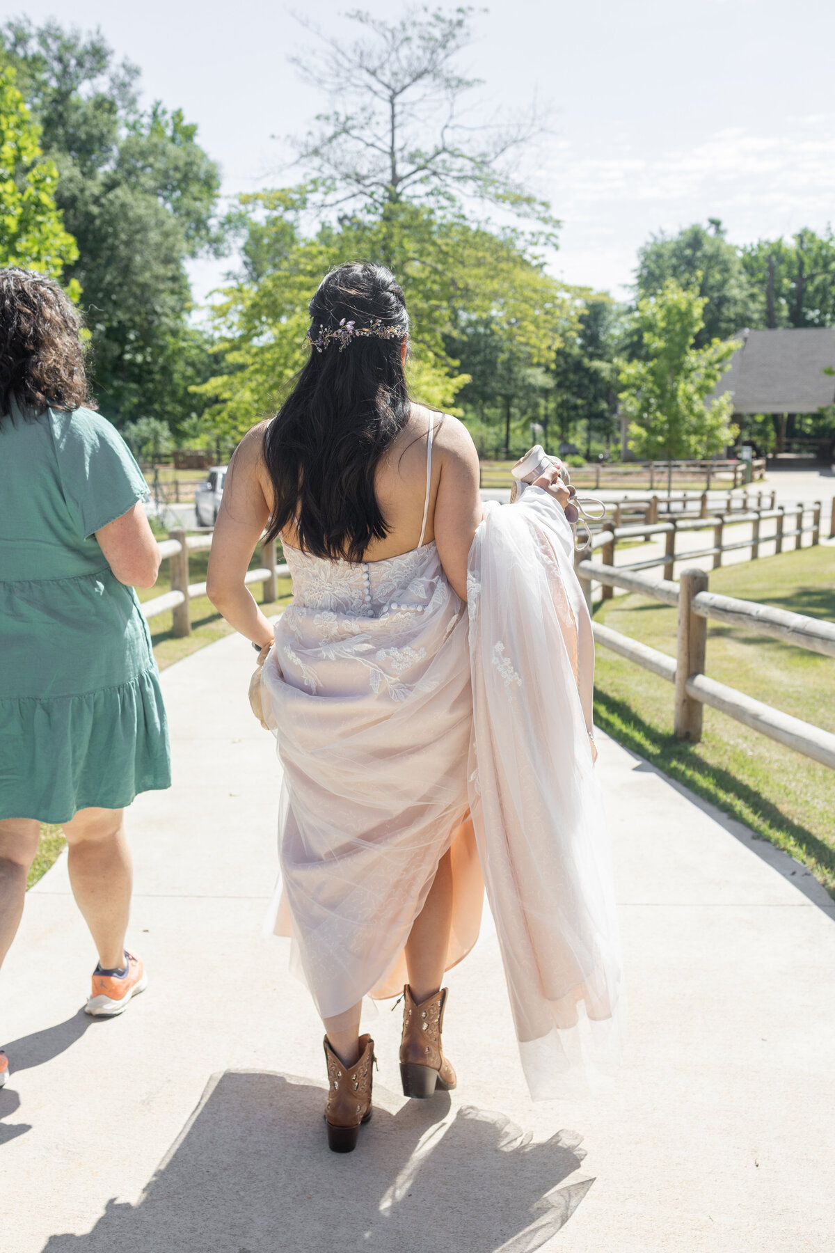 bride-holding-wedding-dress-at-Providence-Canyon-State-Park-Amanda-Richardson-Photography.jpg