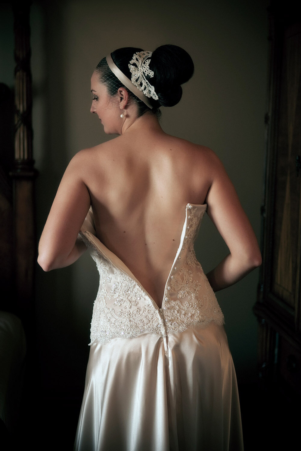 bride getting dressed at Denison Boutique Hotel Rockhampton,QLD