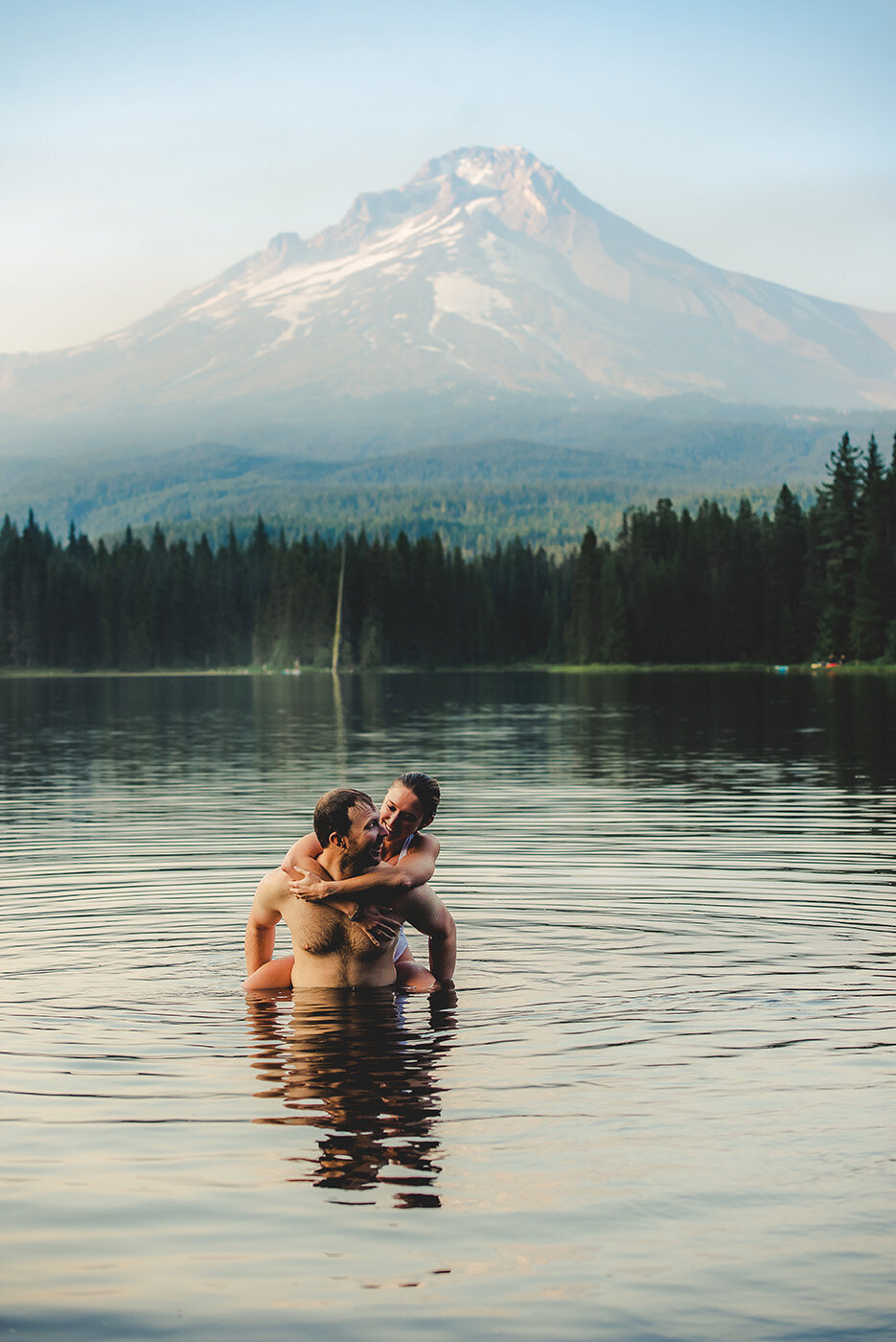couple swimming in lake