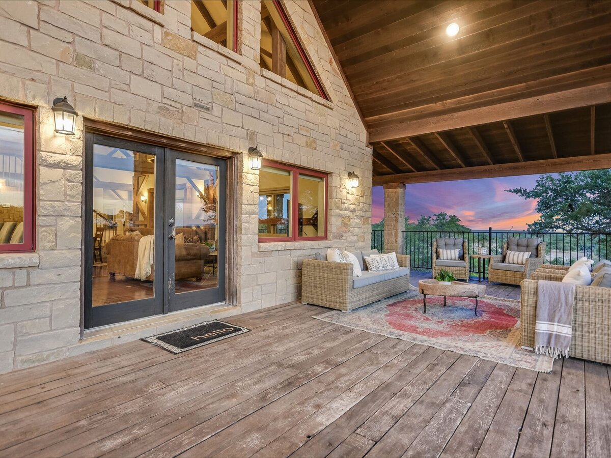 Balcony seating area that leads into main house