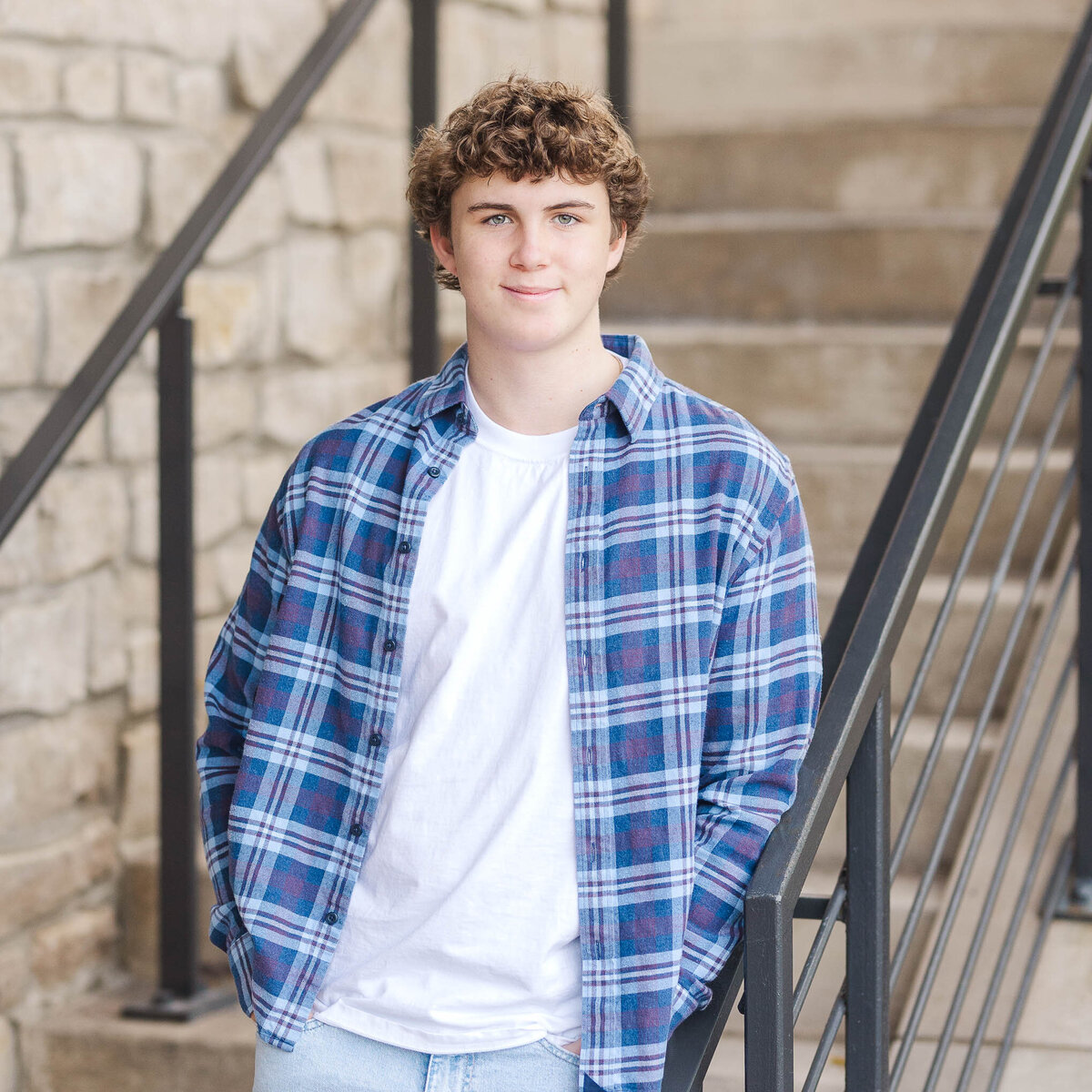 Outdoor senior portrait of a Columbus high school student in downtown Dublin, Ohio with natural lighting.