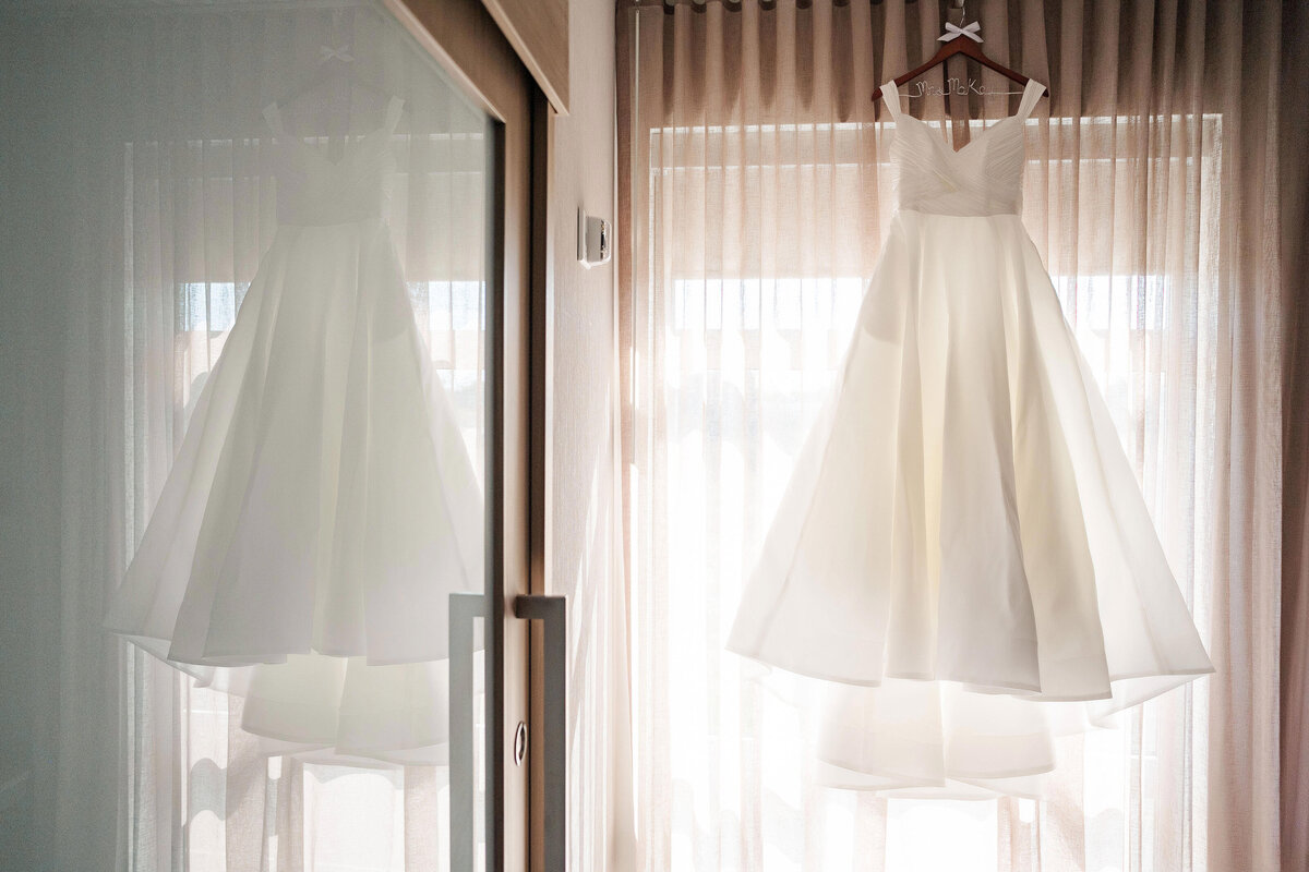 wedding dress hanging in hotel at youngstown wedding