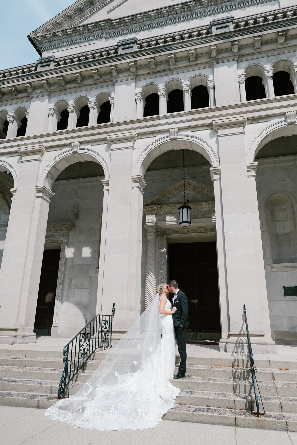 Bride and Groom in front of church