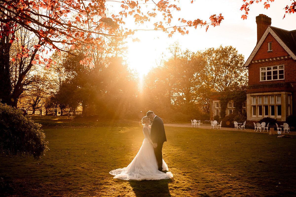Sunset Sillhouette reflection of Bride and Groom during their Southend Barns wedding by Hampshire wedding photographer - Martin Bell Photography