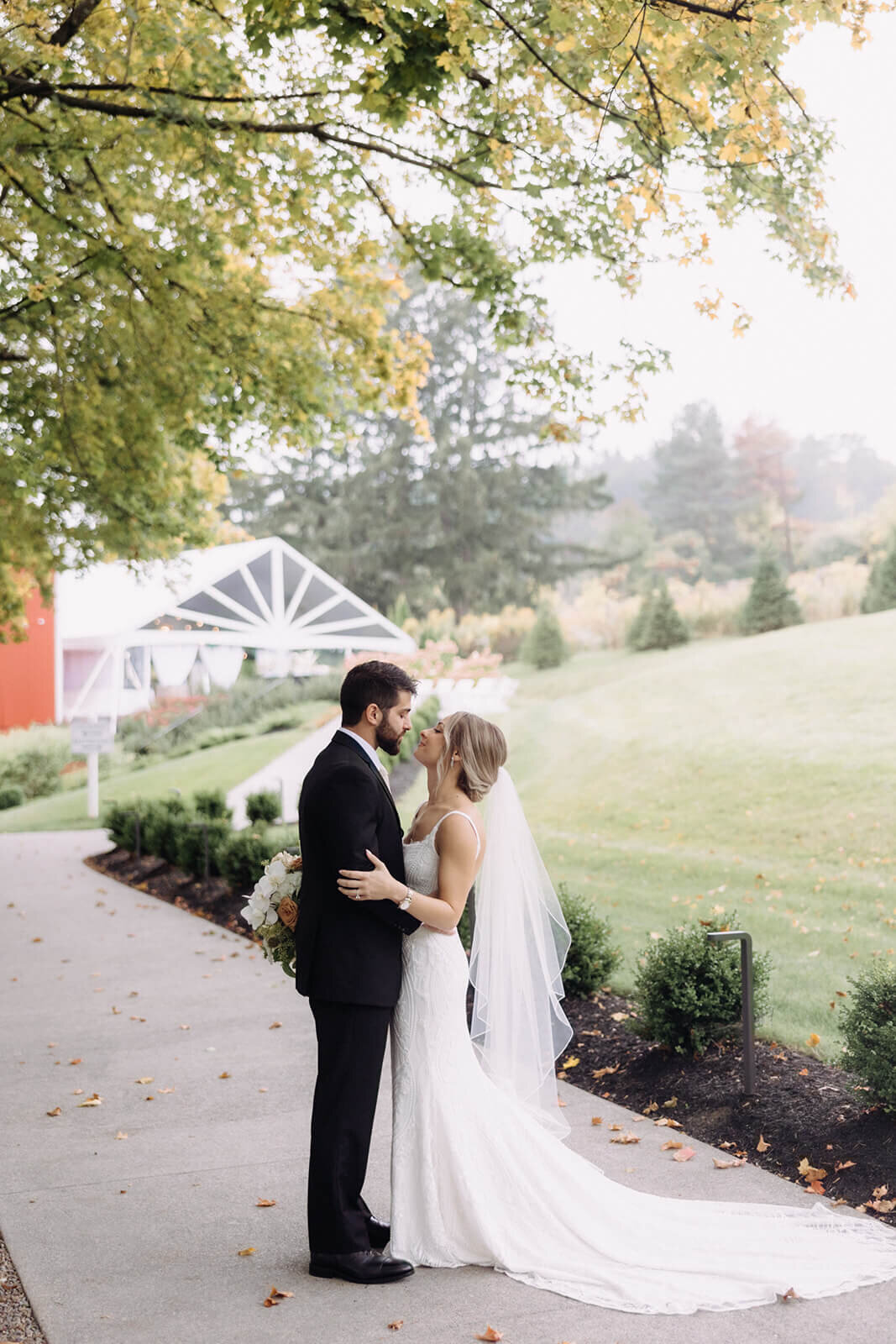 Bride and groom kissing  at  Finger Lakes Wedding, NY