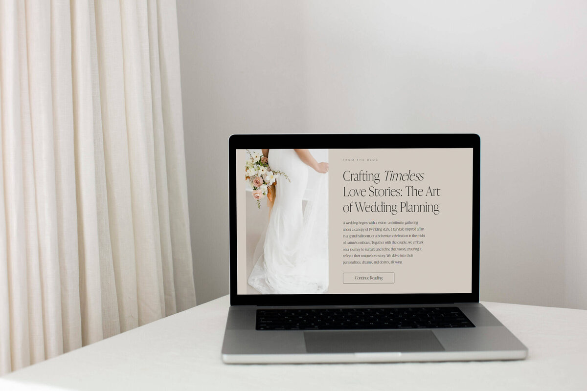 Two female business owners working on laptop and making notes