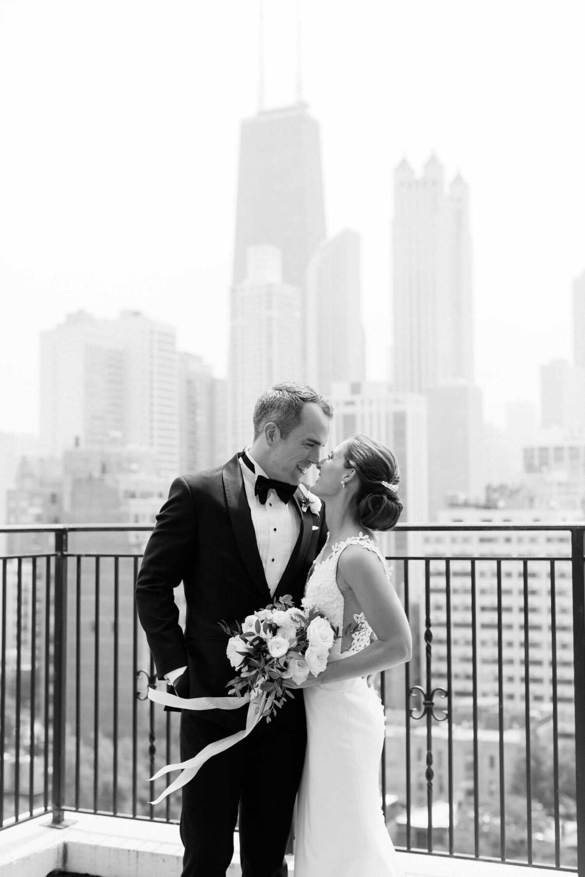Black and White Wedding Day First Look in on the Ambassador Hotel Rooftop in Downtown Chicago.