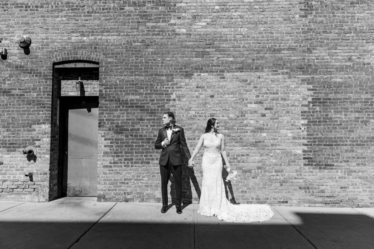 Roundhouse wedding photos with the hotel's brick walls in the background
