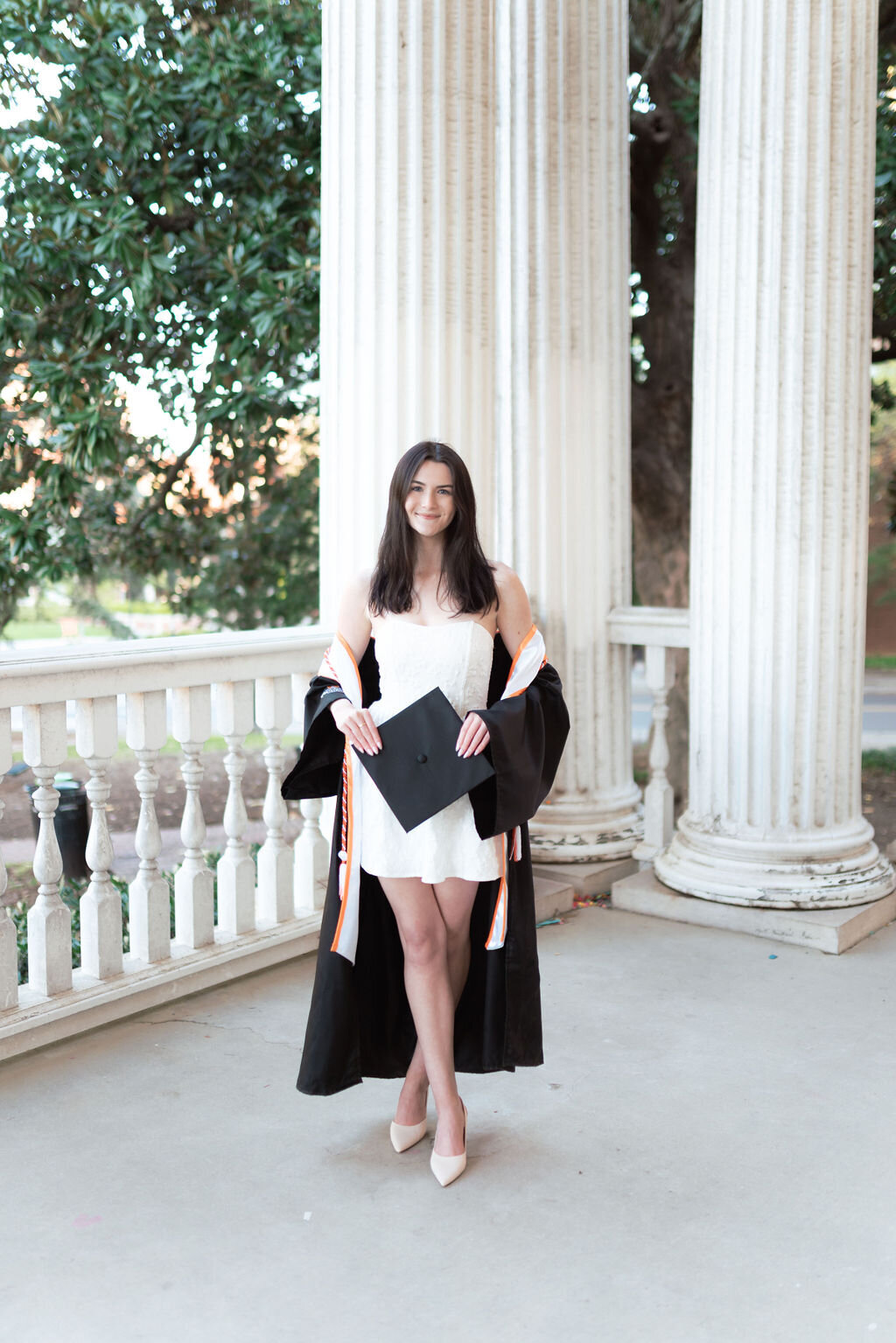 woman in cap and gown at the university of tennessee, knoxville