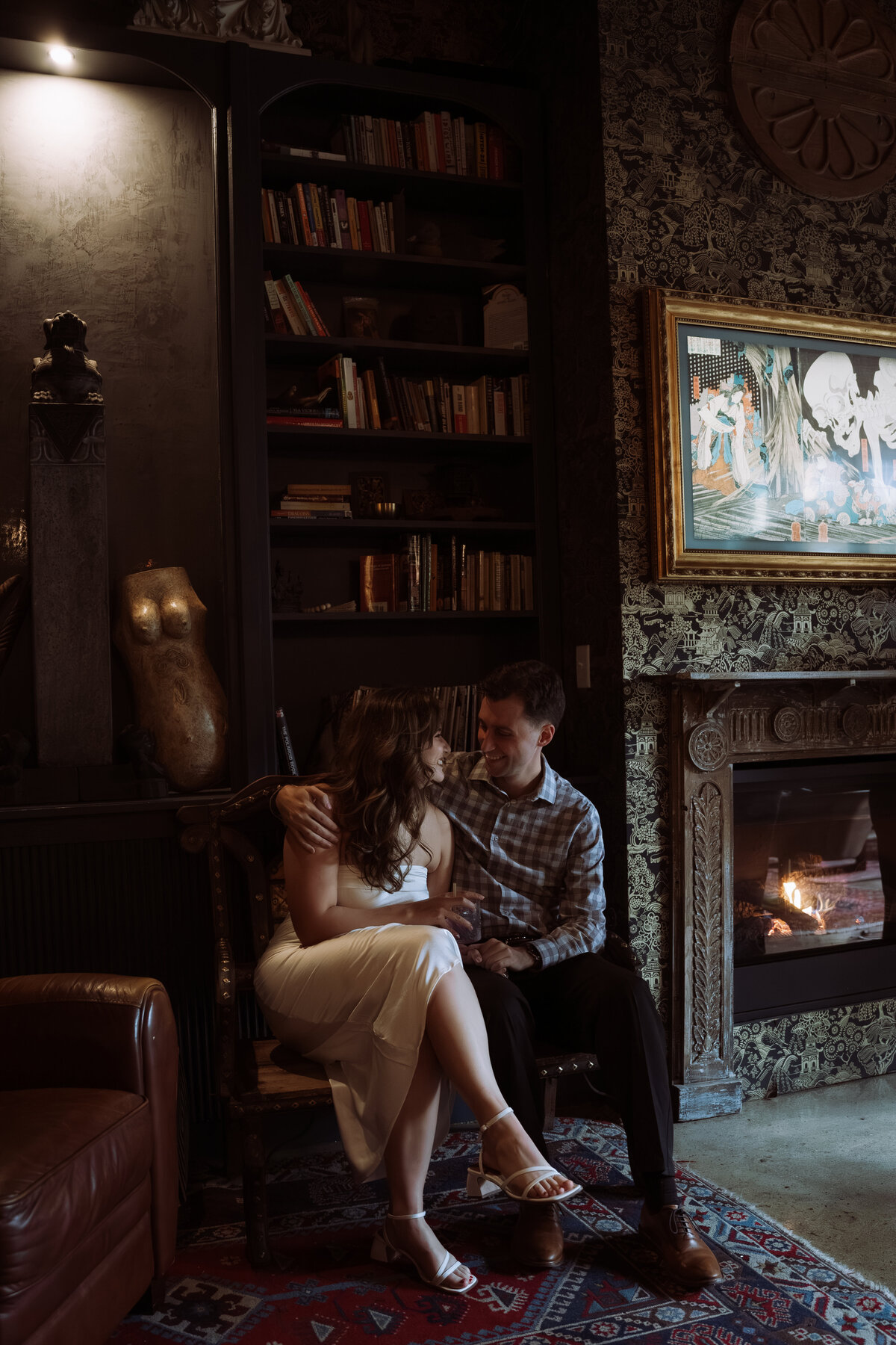 happy couple sitting in chair, moody atmosphere